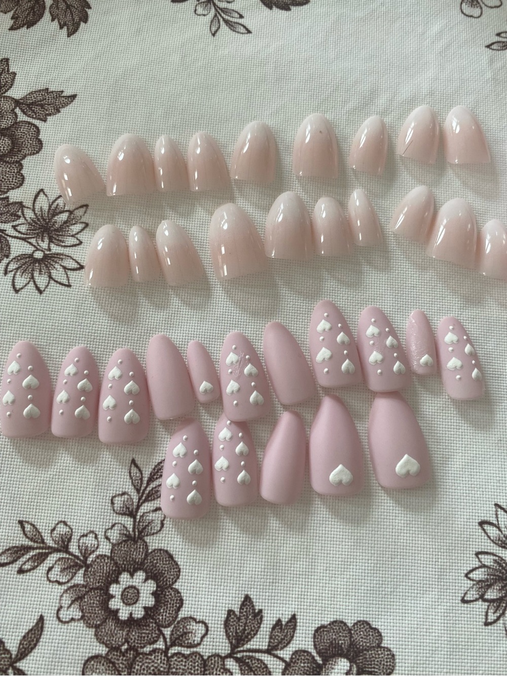 35 not 36 glue on pink hearts plus natural set of nails